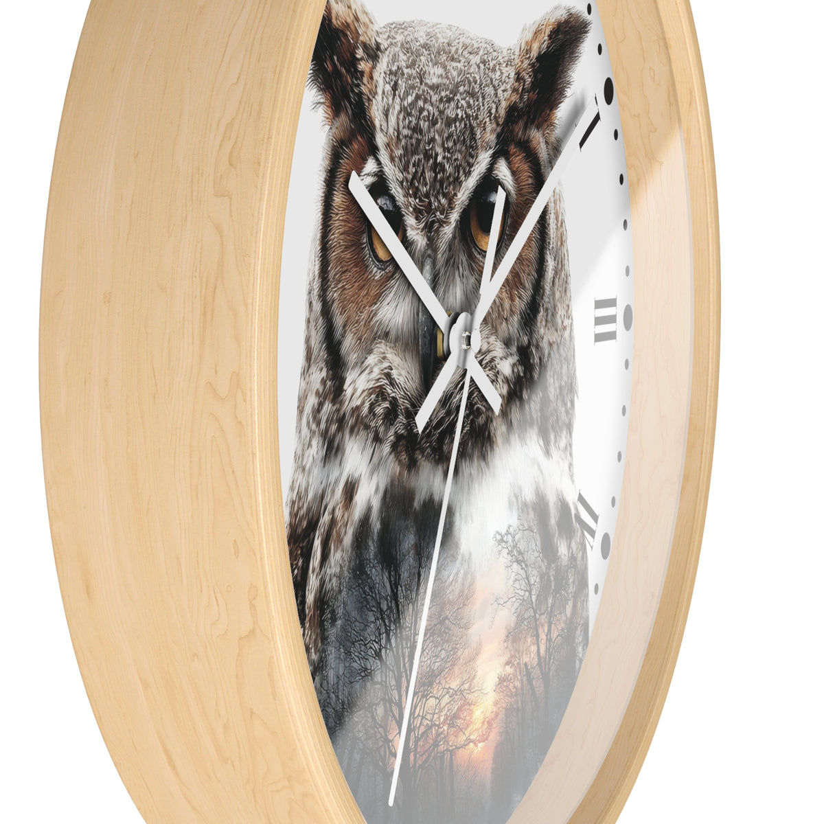Round wall clock with a light natural wood frame and a printed owl face on the clock face, with white hands and black Roman numerals.
