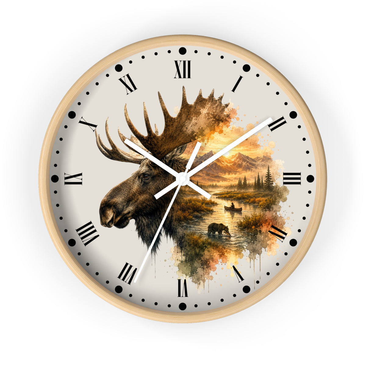 A round wall clock with a light wood frame, featuring a cream-colored face printed with a moose head and a scenic autumn landscape in warm brown, orange, and yellow tones. The clock has black Roman numerals, black dot hour markers, and white hands.