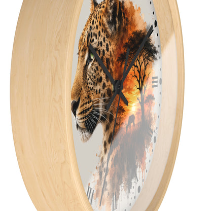 Round wall clock with a light natural wood frame and a printed artwork of a leopard's face merging into an African savanna sunset scene, shown on a white background.