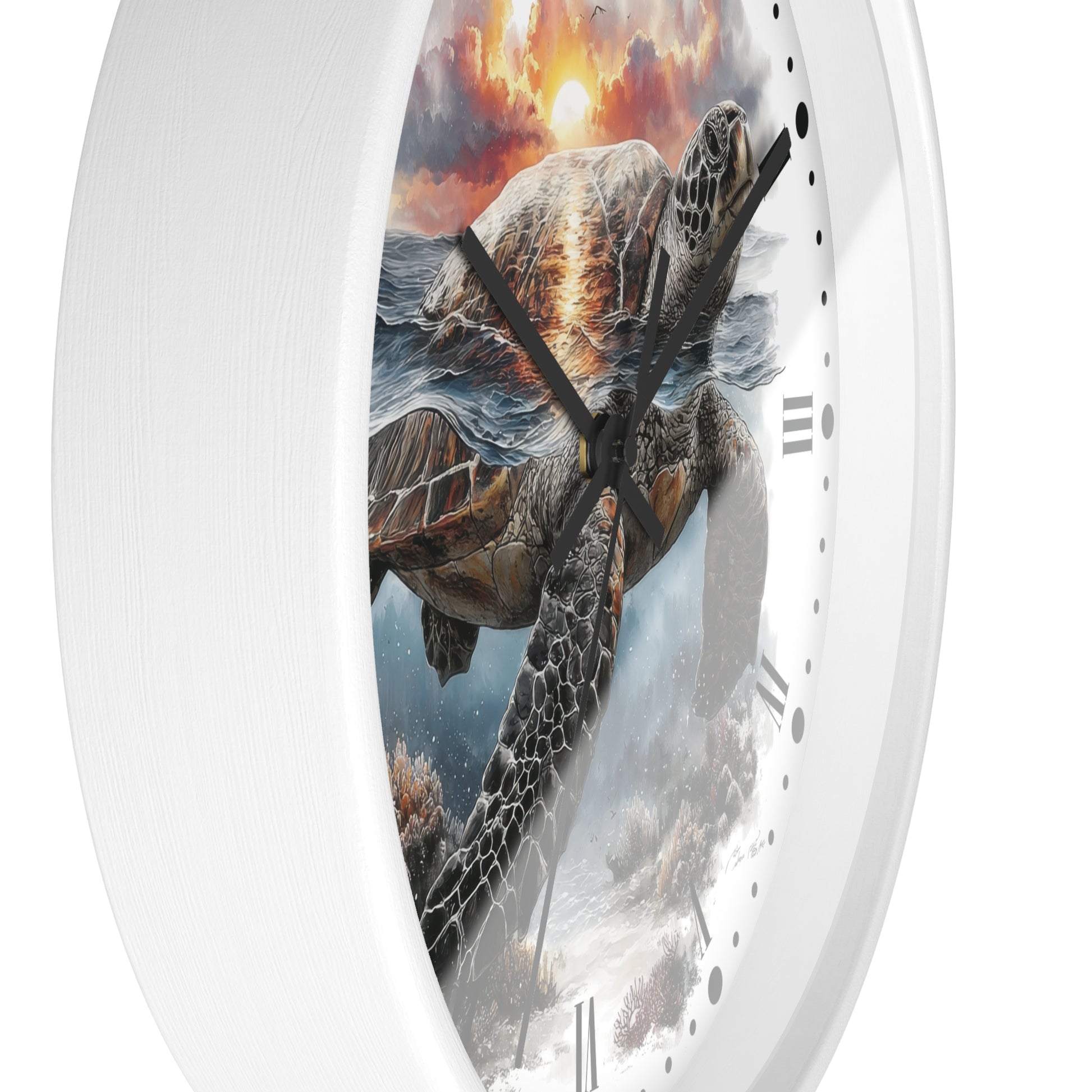 A white round wall clock with a printed sea turtle scene on the face, featuring a dramatic sunset sky and ocean background. The clock is shown cropped at an angle against a plain white background.