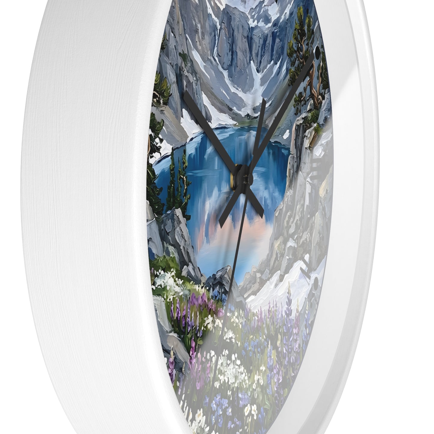 Round wall clock with a white frame and a scenic mountain lake print on the face, photographed against a plain white background.