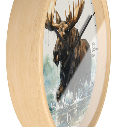 Round wall clock with a light natural wood frame and a printed moose artwork on the face, shown against a plain white background.
