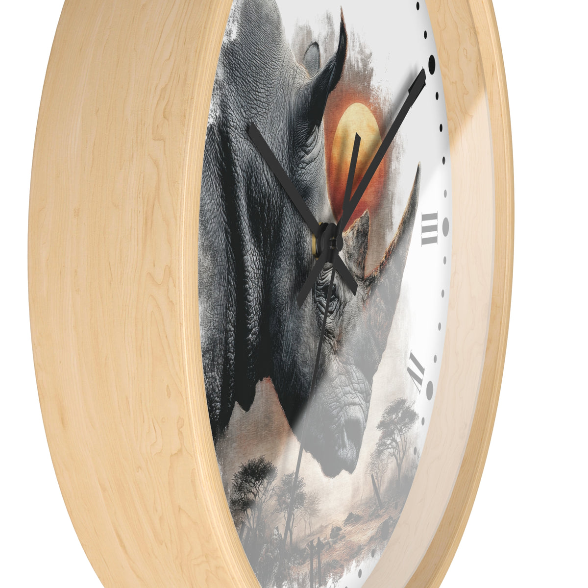 Round wall clock with a light natural wood frame and a printed face featuring a rhinoceros over an African savanna scene at sunset, shown on a white background.