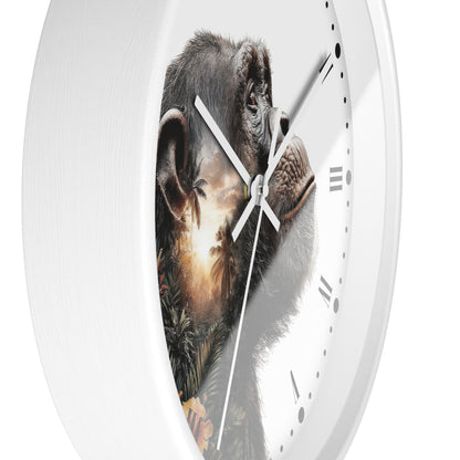 A white round wall clock with a printed chimpanzee face across the dial and silver hands, shown against a plain white background.