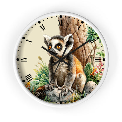 A round wall clock with a white frame and a detailed illustration of a ring-tailed lemur sitting in front of a tree trunk, with Roman numerals on a cream-colored dial.