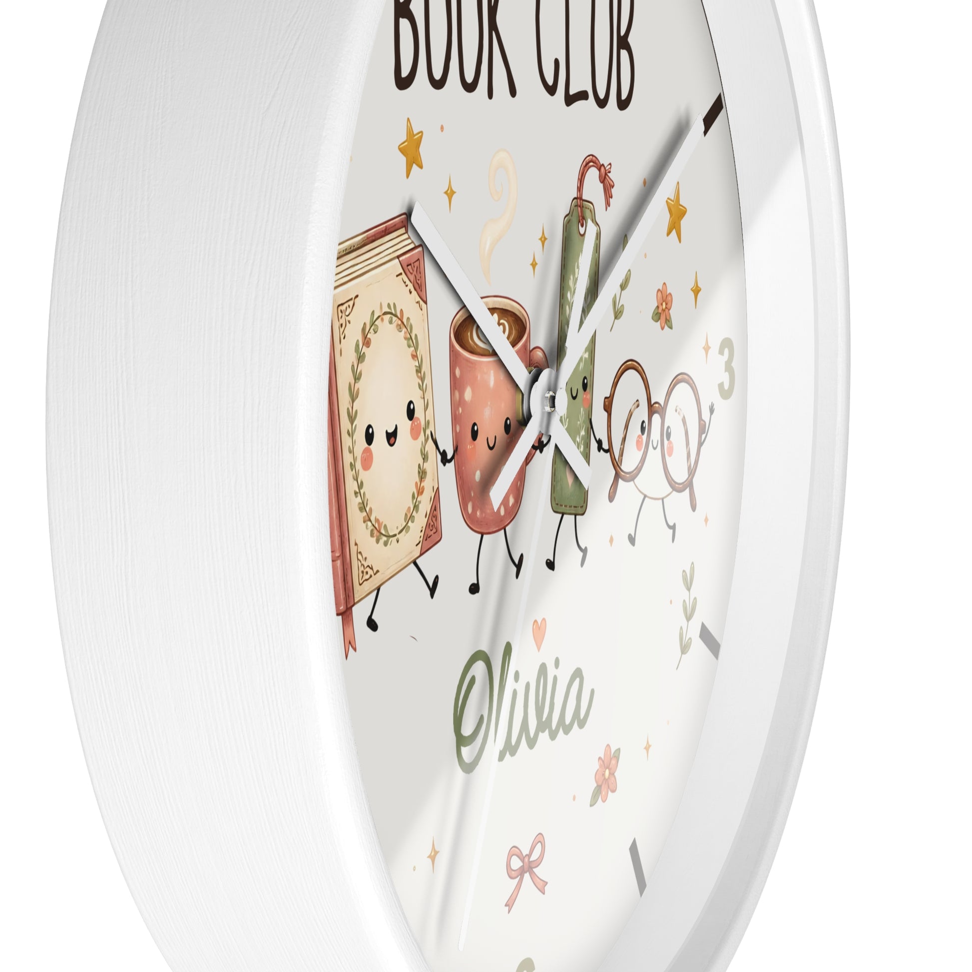 A round white wall clock with a whimsical book-and-drink illustration on the face. The design includes a smiling book, a coffee mug, a green book, glasses, stars, and the text 'BOOK CLUB' and the name 'Olivia'.