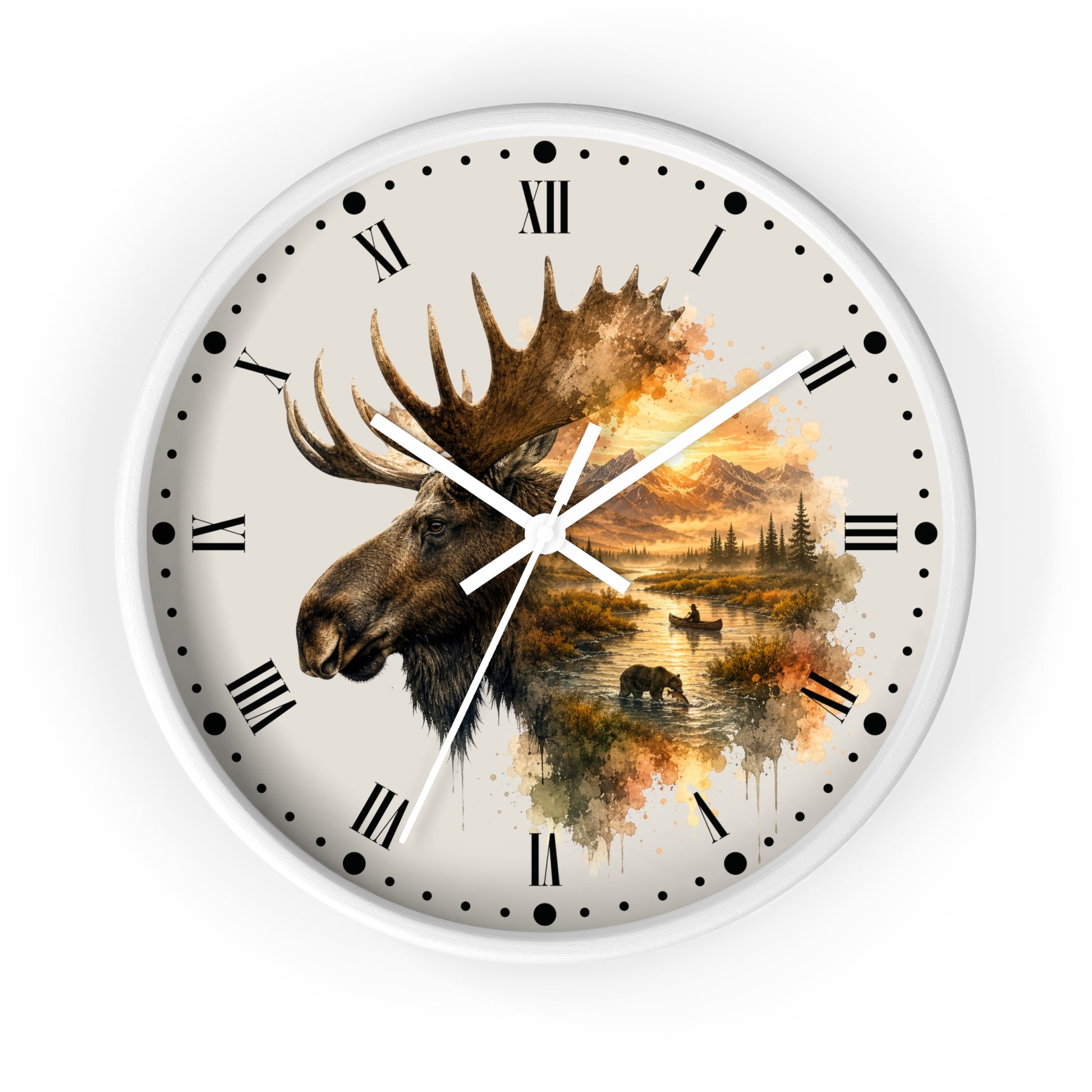 A round wall clock with a white frame and a cream-colored face featuring a moose head over a scenic landscape in warm autumn tones, with black Roman numerals and hands.