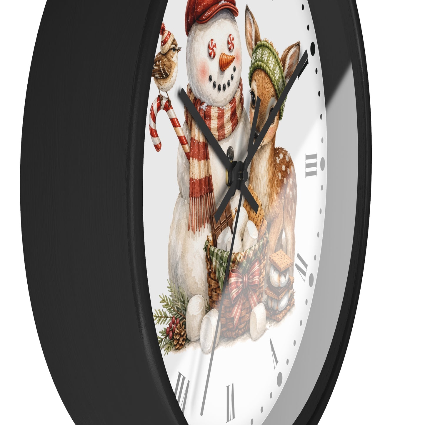 A round wall clock with a black frame and a white face featuring a festive illustration of a snowman and a deer wearing winter hats, with black Roman numeral hour markers.