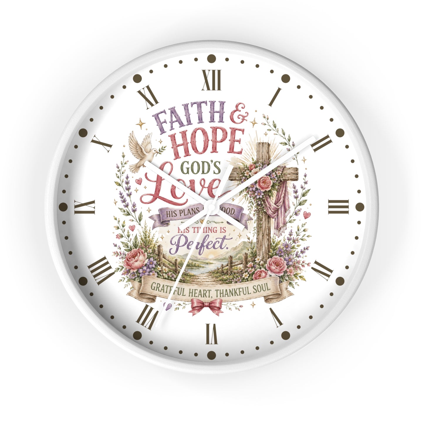 A round white wall clock with a Christian-themed floral and cross graphic on the face, featuring Roman numerals and the words 'Faith & Hope God's Love' and 'This Plan is Perfect.'.