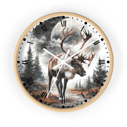 Round wall clock with a light wood frame and a printed scenic dial showing a large reindeer in a forest under a full moon, with black Roman numerals and white hands on a white background.
