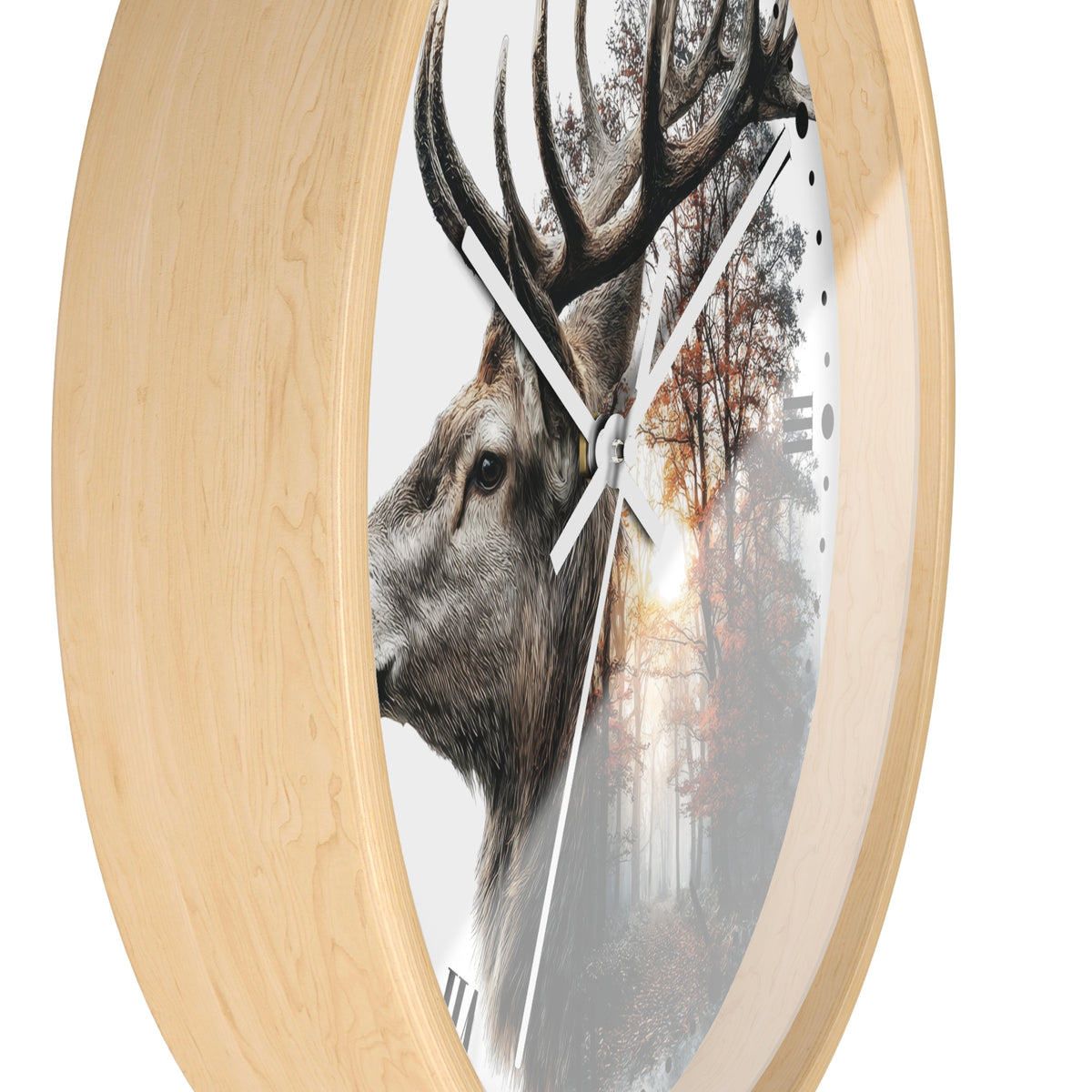Round wall clock with a light natural wood frame and a printed design featuring a deer head over a misty forest scene, shown on a white background.