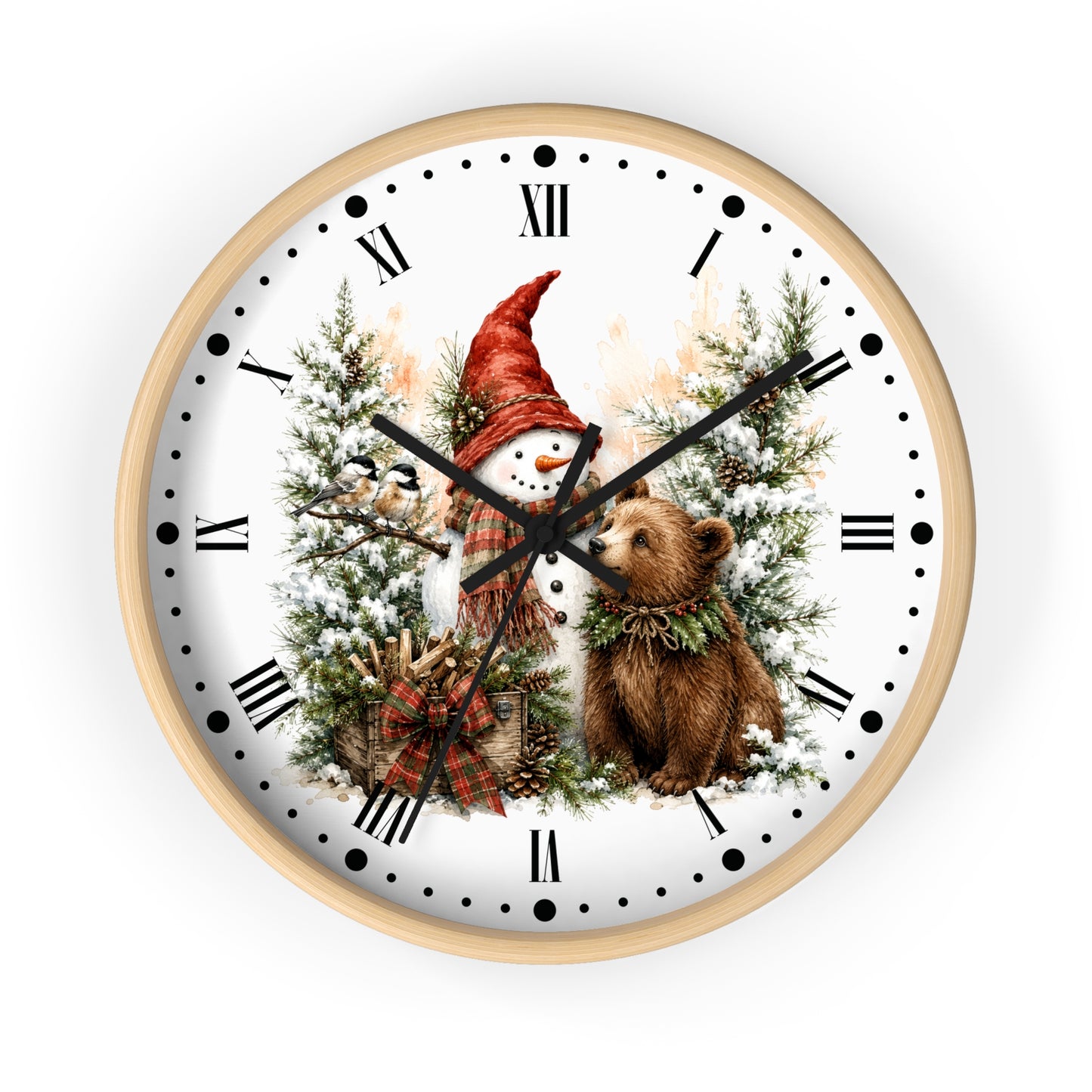 A round wall clock with a light wood frame and a white face featuring a winter holiday illustration of a snowman in a red hat among snowy trees, with a brown bear at the center. The clock is shown against a plain white background.