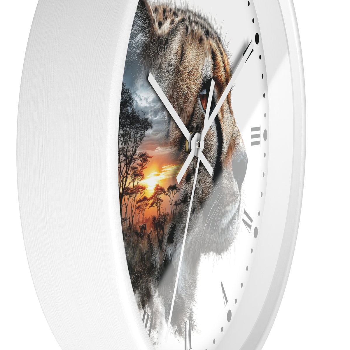 A white round wall clock with a split-face design: one half shows a close-up cheetah face, and the other half shows an African savanna sunset scene. The clock has white hands, black Roman numerals, and a thin second hand.