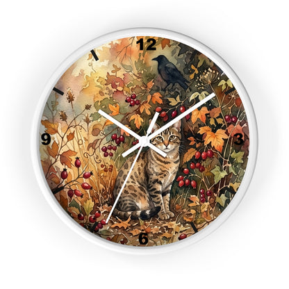 Round wall clock with a white frame and a detailed autumn nature illustration on the face, featuring a tabby cat, a black bird, leaves, berries, and numerals from 1 to 12.