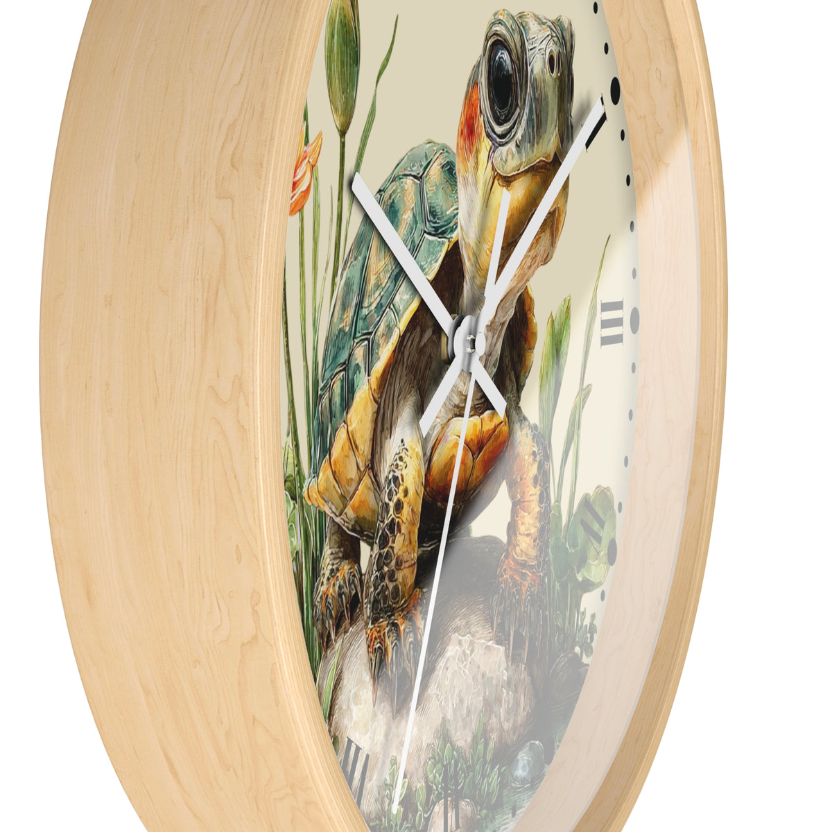 Round wall clock with a light natural wood frame and a printed turtle illustration on the face, shown against a plain white background.