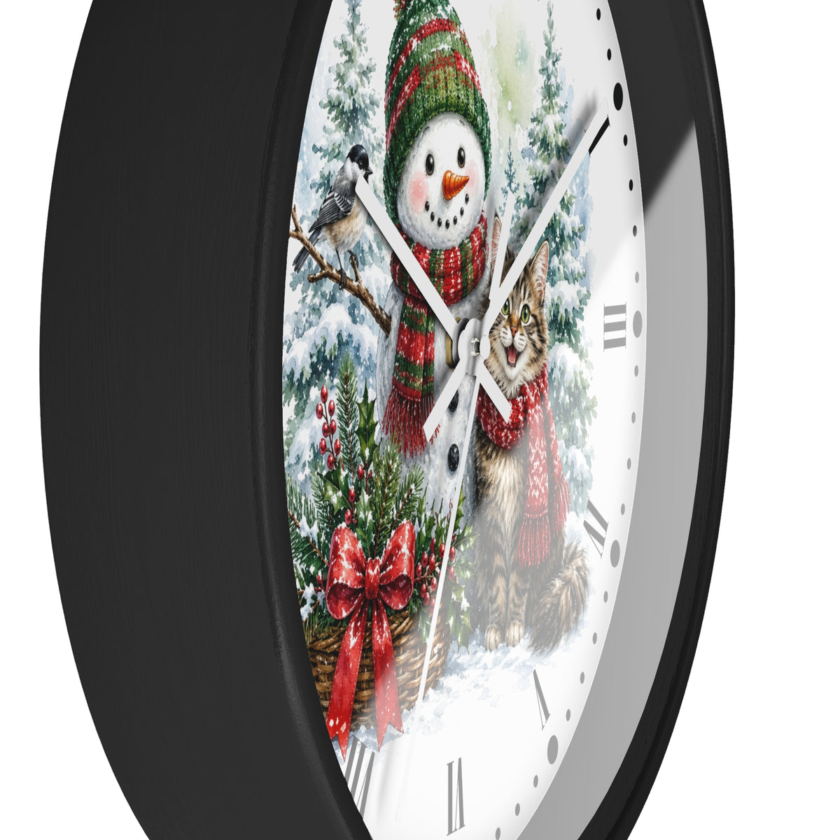 A round wall clock with a black frame and a white face featuring a winter holiday illustration of a snowman, a cat, evergreen trees, and red bows.