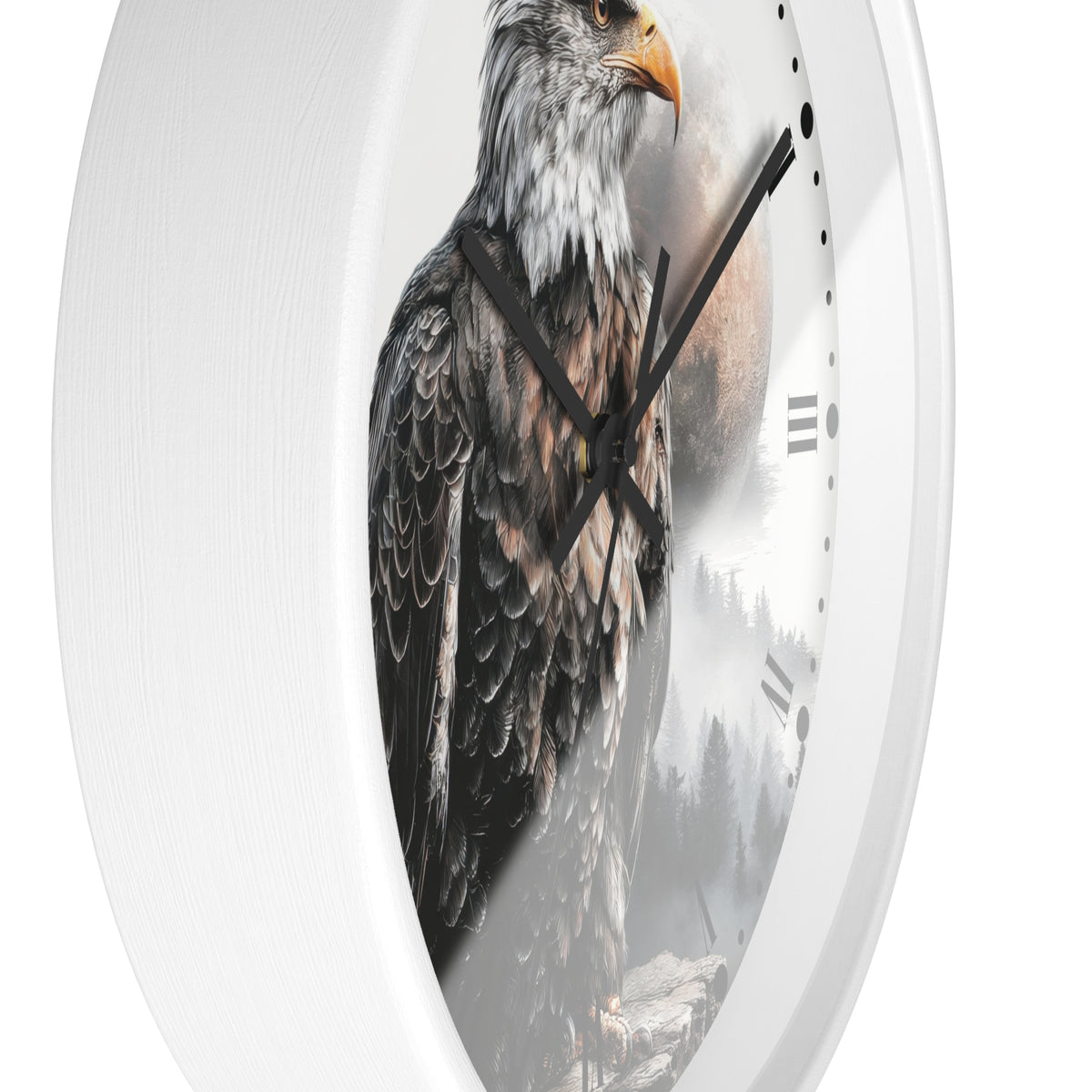 A white round wall clock featuring a printed design of a bald eagle over a misty forest and moon, with black hands and minimalist hour markers.
