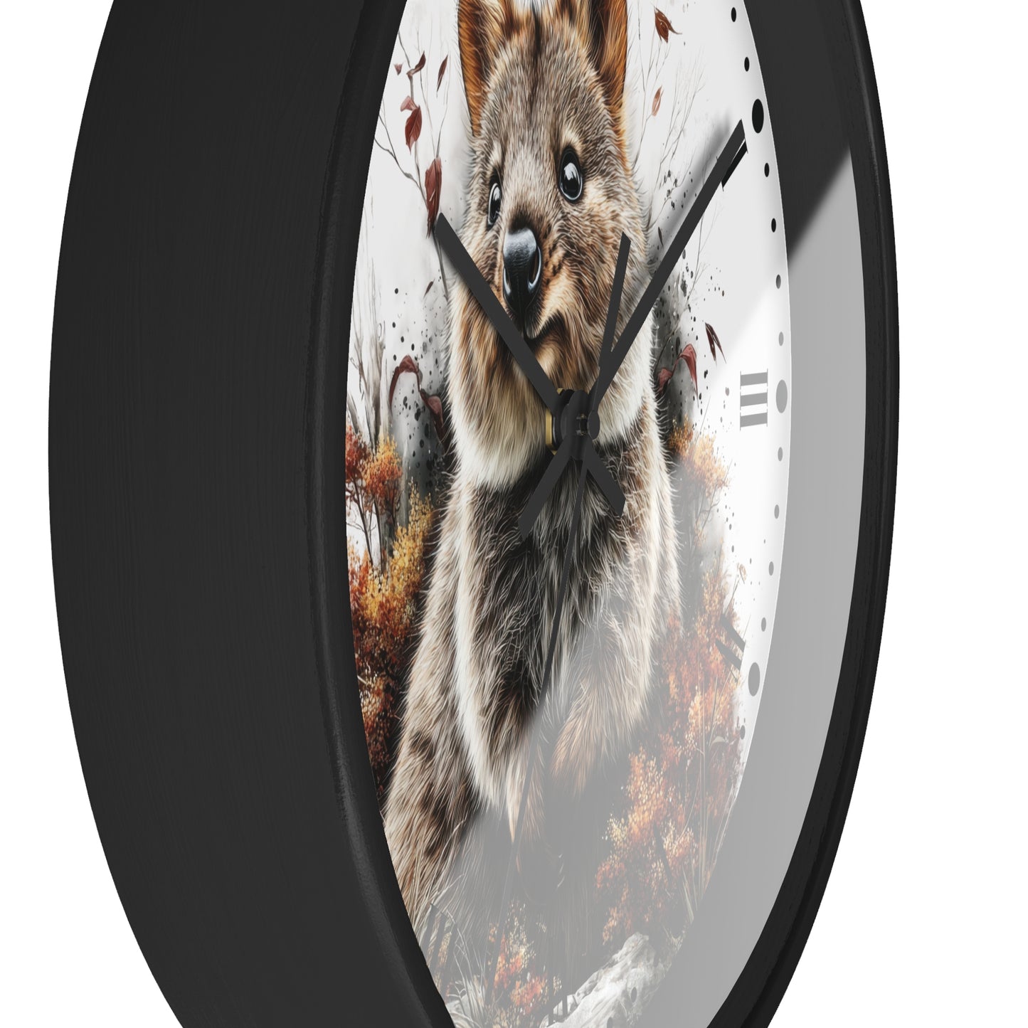 A round wall clock with a black frame and a printed quokka face on the dial, shown against a plain white background.