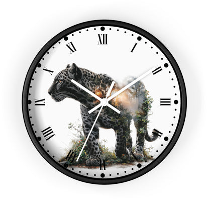 A round wall clock with a black frame and a white face featuring a large spotted big cat printed across the center, with black Roman numerals and white hands, shown on a plain white background.