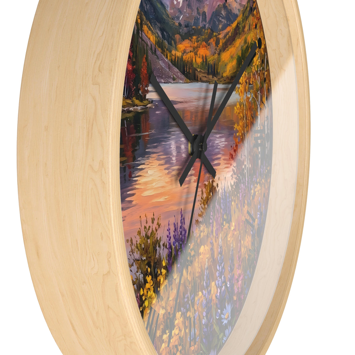 Round wall clock with a light natural wood frame and a colorful scenic print of an autumn mountain lake, shown on a white background.