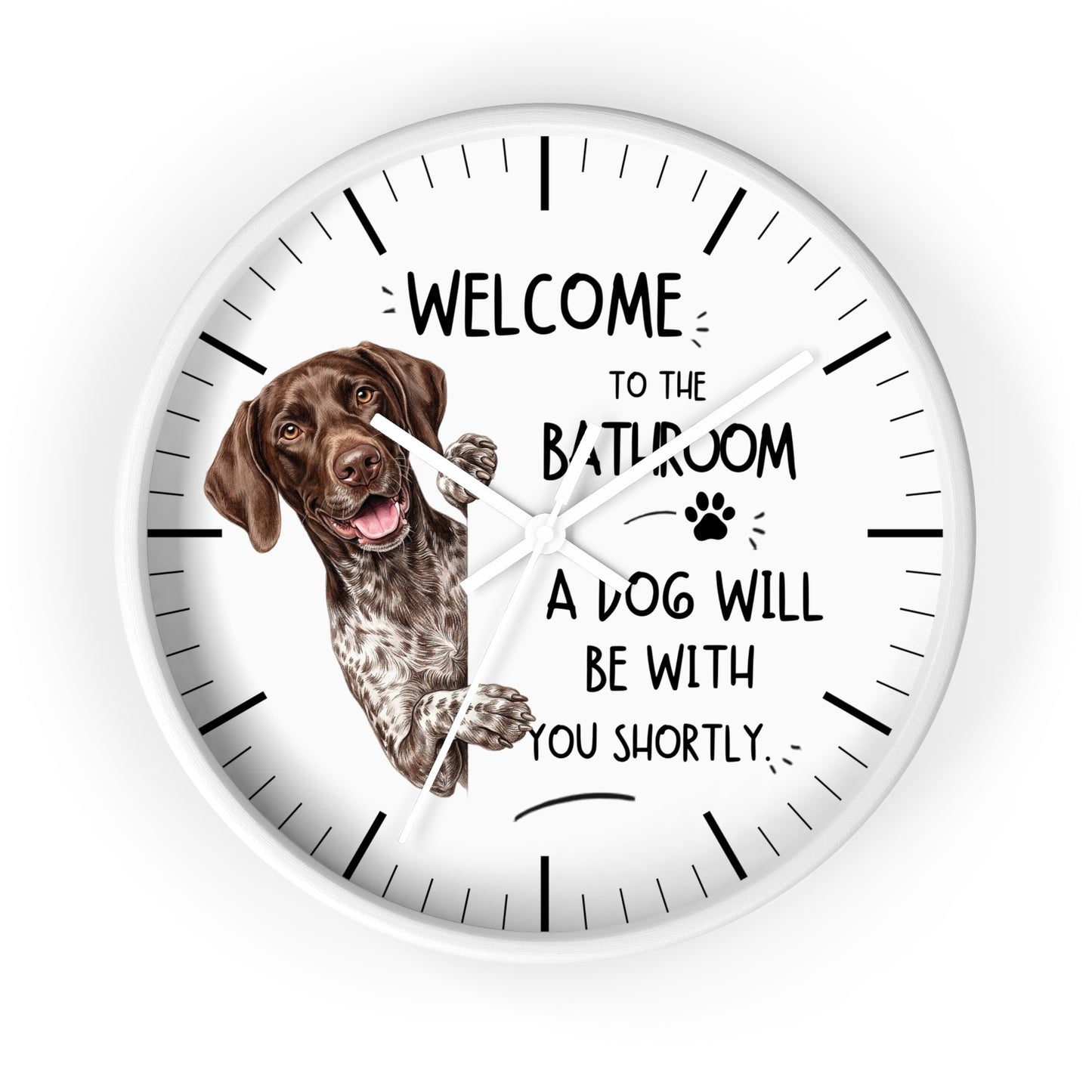 A round white wall clock with black hands and black hour markers, featuring a brown and white German Shorthaired Pointer dog illustration on the left and the text 'WELCOME TO THE BATHROOM A DOG WILL BE WITH YOU SHORTLY' on a white background.