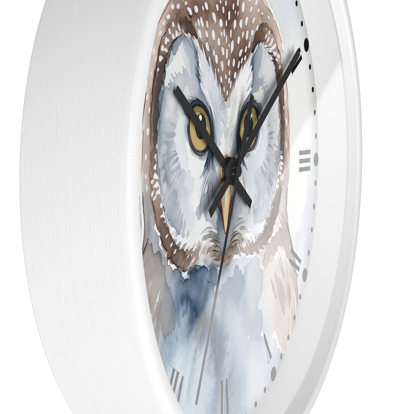 A close-up of a round wall clock with a white frame and a watercolor-style owl face printed on the dial. The clock has black hands, black hour markers, and a white background.