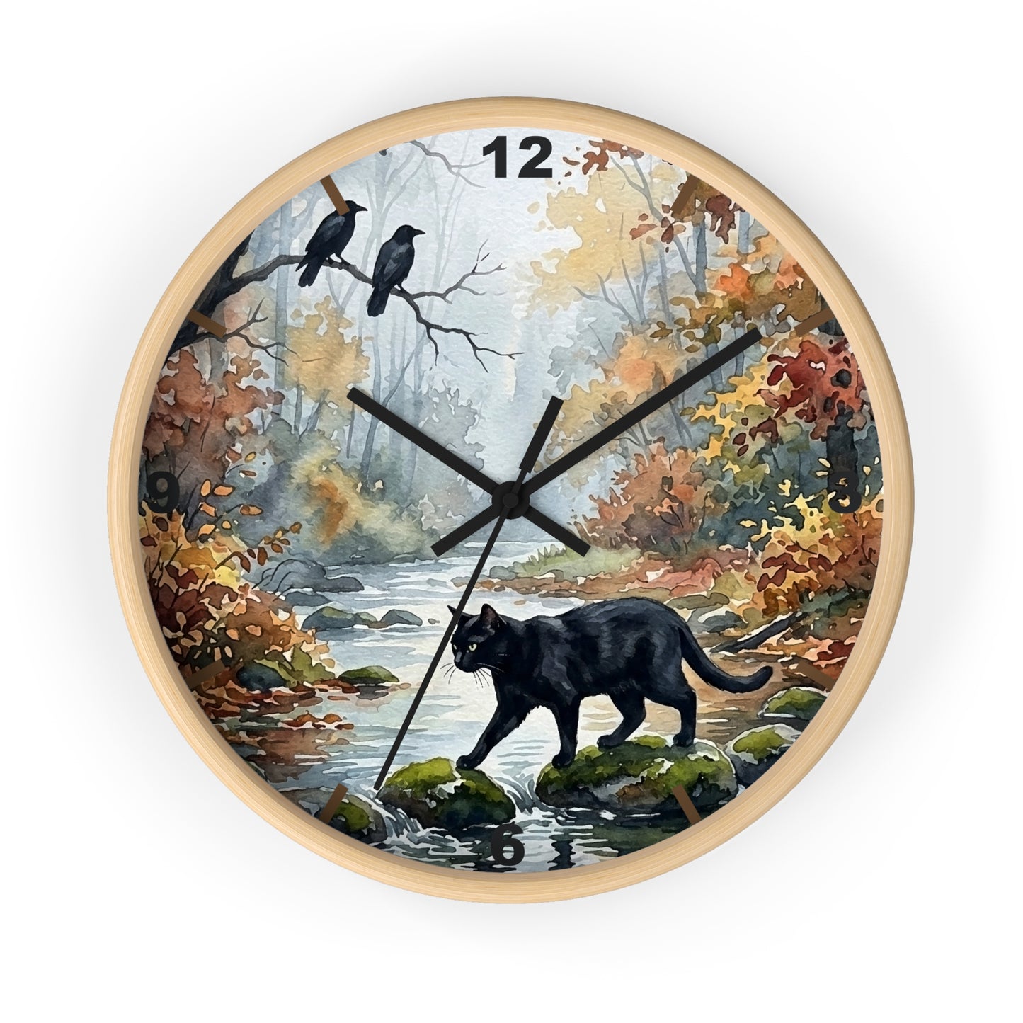 A round wall clock with a light wood frame featuring an autumn forest illustration. The design shows a black cat walking along a stream, two crows on branches, and colorful fall foliage, with black clock hands.