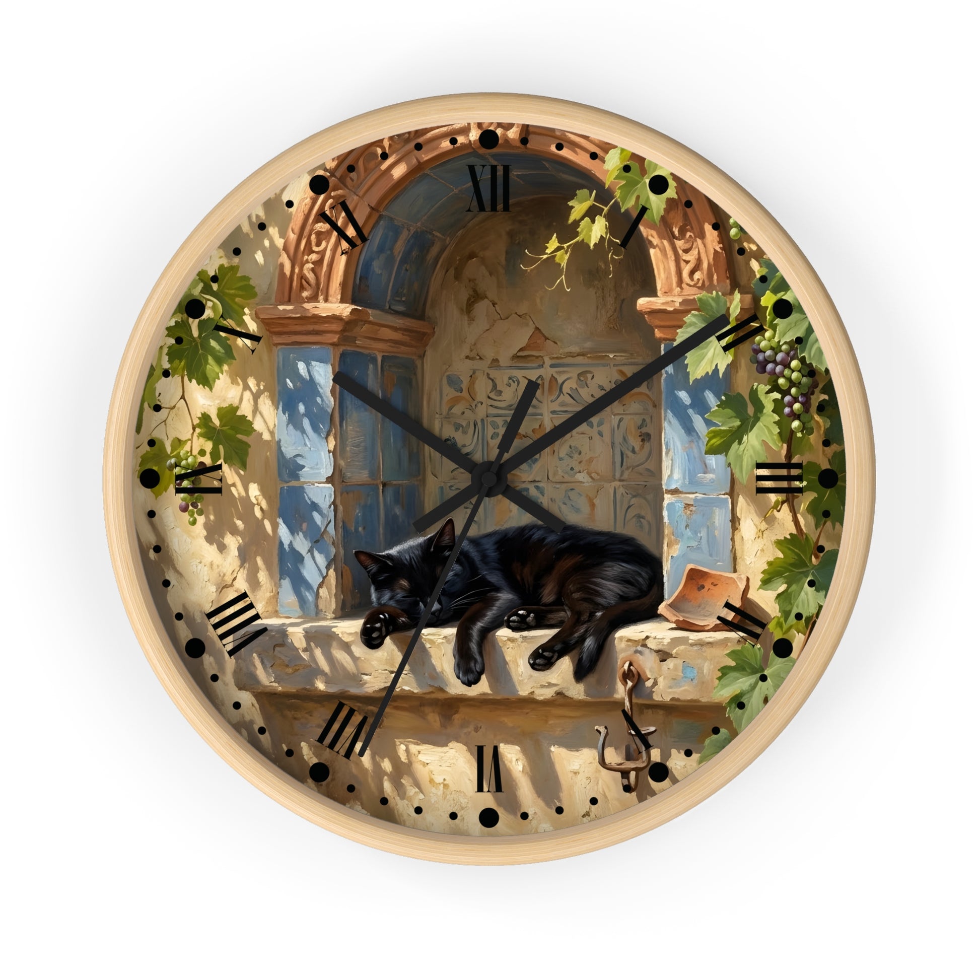 Round wall clock with a light wood frame and a printed illustration of a black cat lounging on a stone windowsill in front of blue shutters and climbing vines, with black Roman numerals and black clock hands.