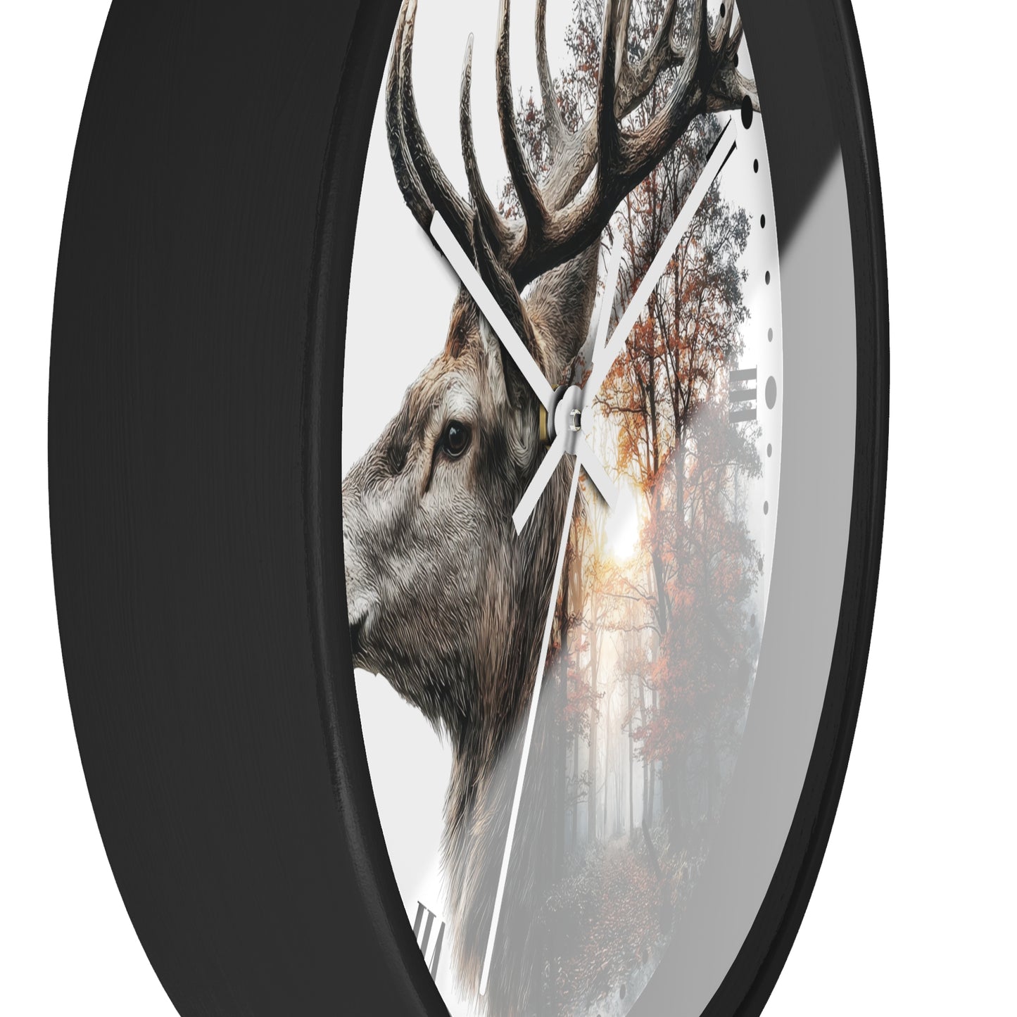 A round wall clock with a black frame and a printed design featuring a deer head over an autumn forest scene, shown against a plain white background.