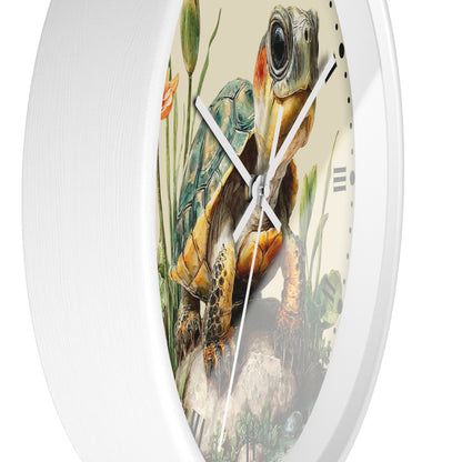 A white oval wall clock featuring a detailed illustration of a sea turtle on the clock face, with ornate clock hands and black hour markers.