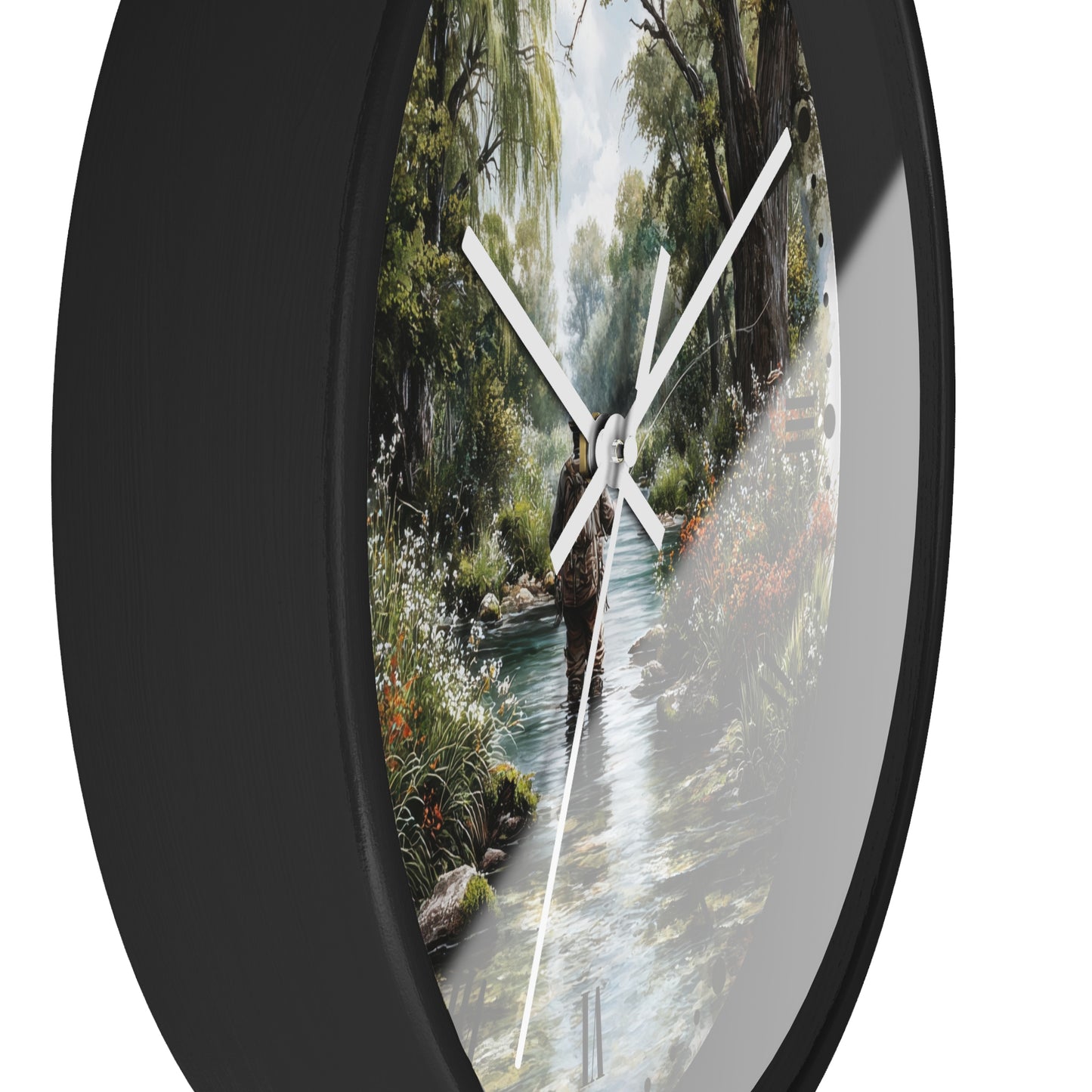 Round wall clock with a black frame and a scenic nature print of a person walking along a stream, shown against a white background.