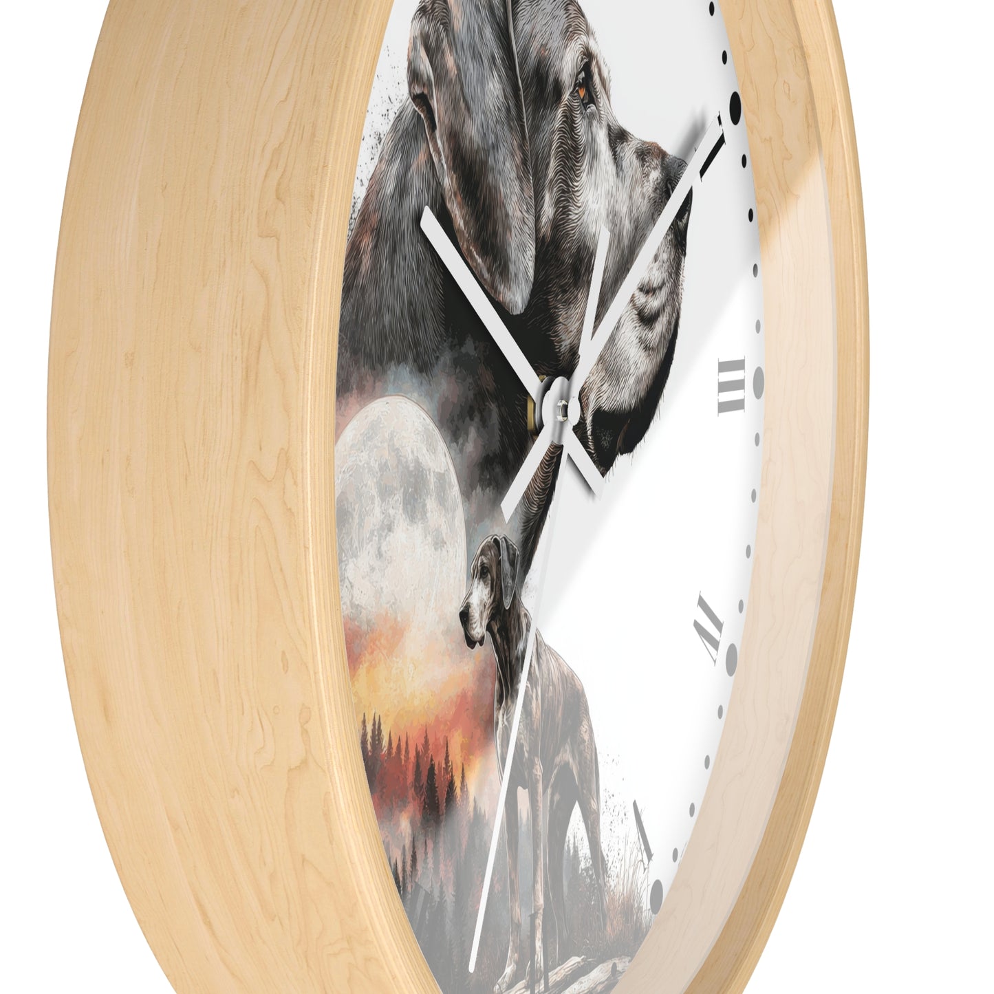 Round wall clock with a light natural wood frame and a white face featuring a printed graphic of a gray dog, a wolf, a full moon, and a sunset landscape.
