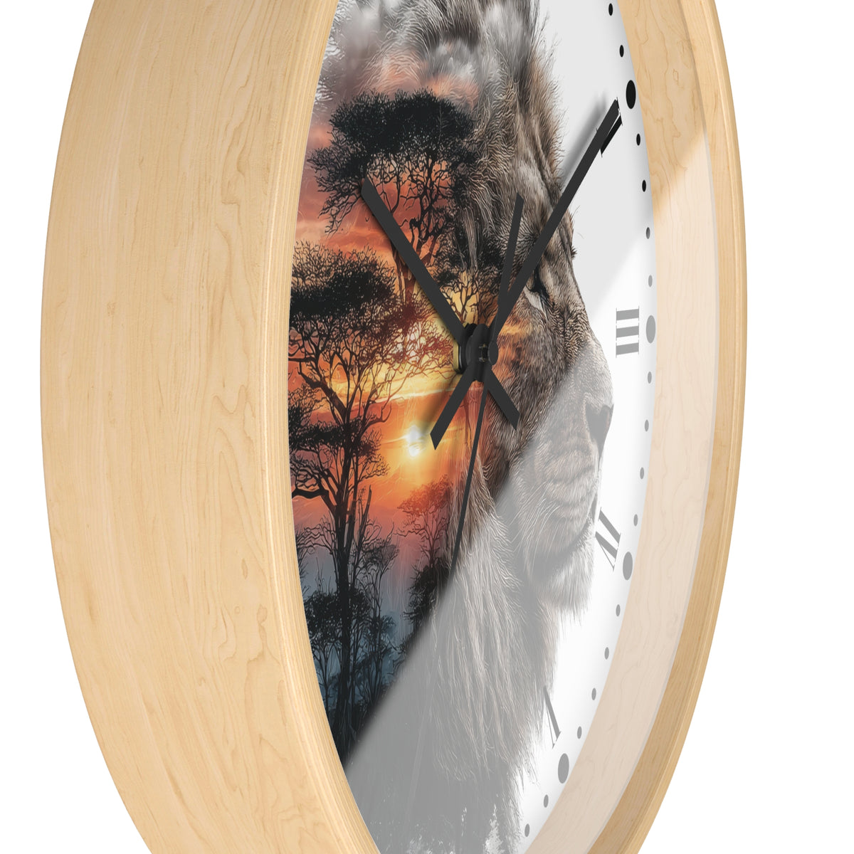 Round wall clock with a light natural wood frame and a printed face featuring a lion silhouette over an African savanna sunset scene, shown on a white background.