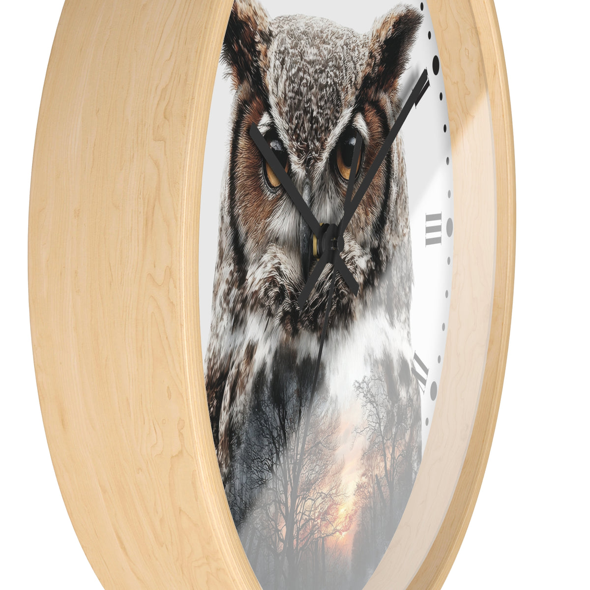Round wall clock with a light natural wood frame and a printed owl face over a forest scene on the clock face, shown against a plain white background.