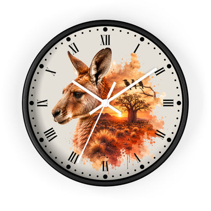 A round wall clock with a black frame and a custom printed dial featuring a kangaroo profile, a tree silhouette, and an orange sunset scene on a light background.