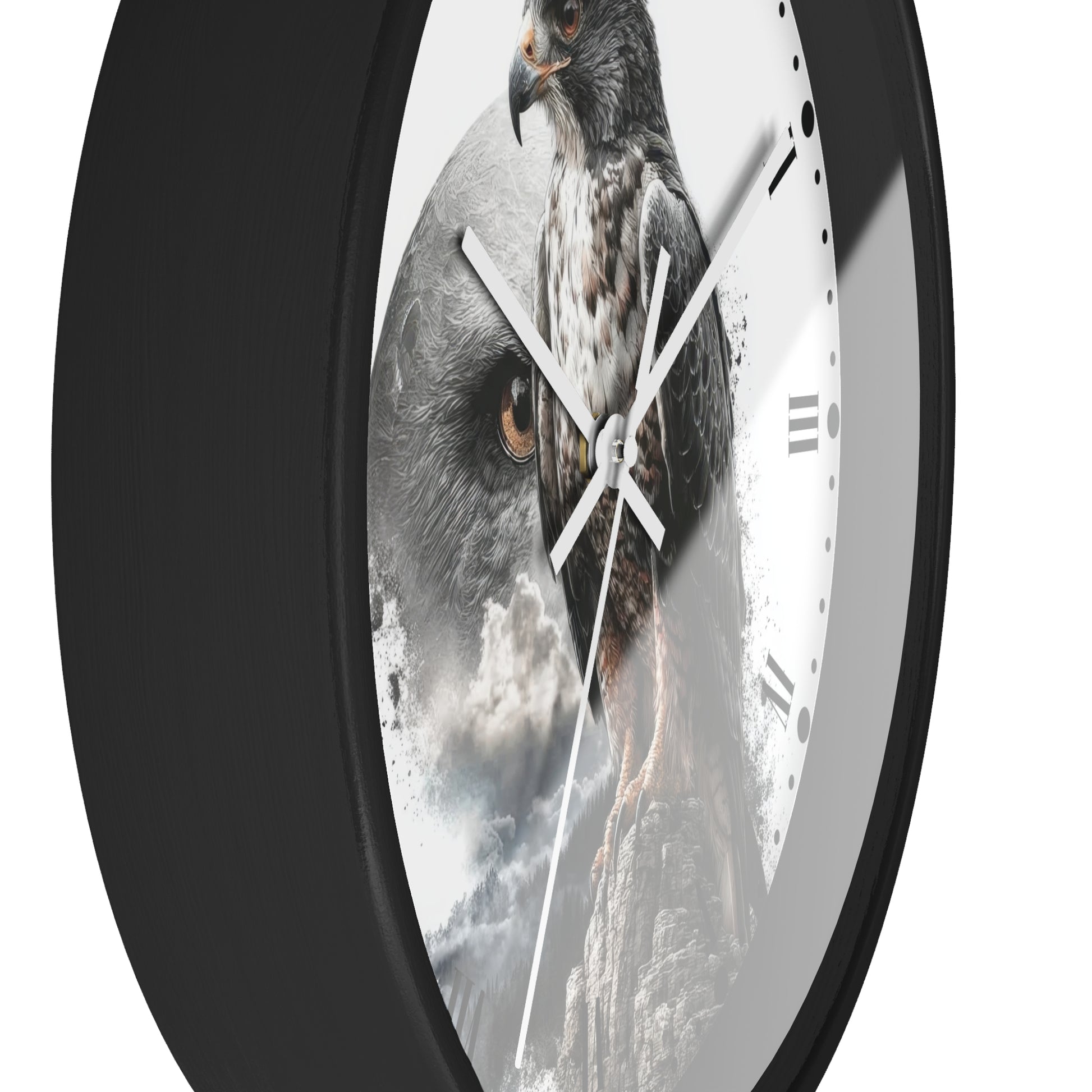 A close-up of a round wall clock with a black frame and a white face featuring a detailed photograph of a hawk and mountain scene.