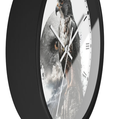 A close-up of a round wall clock with a black frame and a white face featuring a detailed photograph of a hawk and mountain scene.