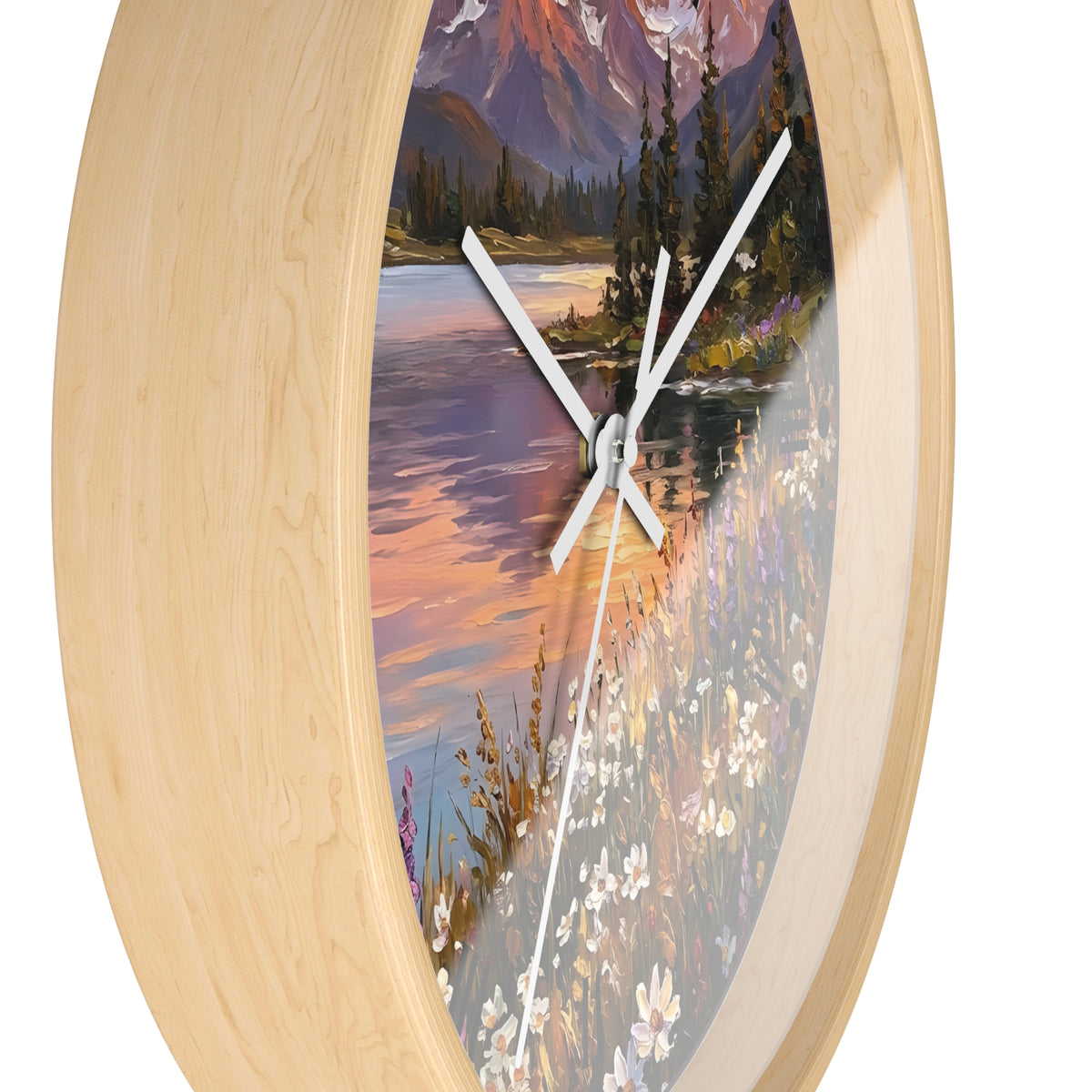Round wall clock with a light natural wood frame and a scenic landscape print featuring a lake, mountains, trees, and wildflowers, with white clock hands.