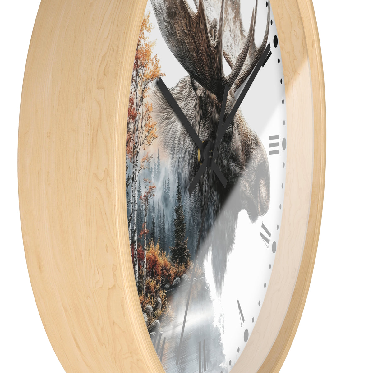 Round wall clock with a light natural wood frame and a printed face showing a moose head over a misty forest scene, with black hands and Roman numerals on a white background.