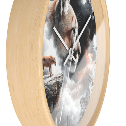 Round wall clock with a light natural wood frame and a printed scenic face showing a large cougar head, a smaller cougar standing on a rock, and cloudy sky imagery.