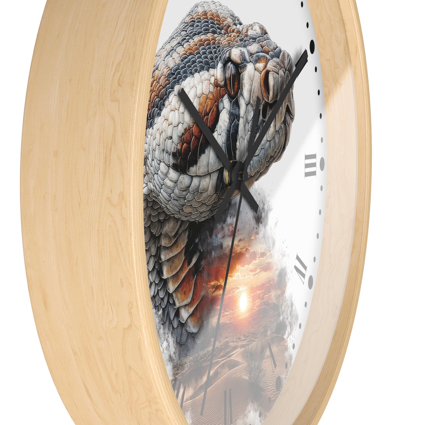 A close-up of a round wall clock with a light natural wood frame and a printed face showing a detailed snake head over a desert sunset scene.