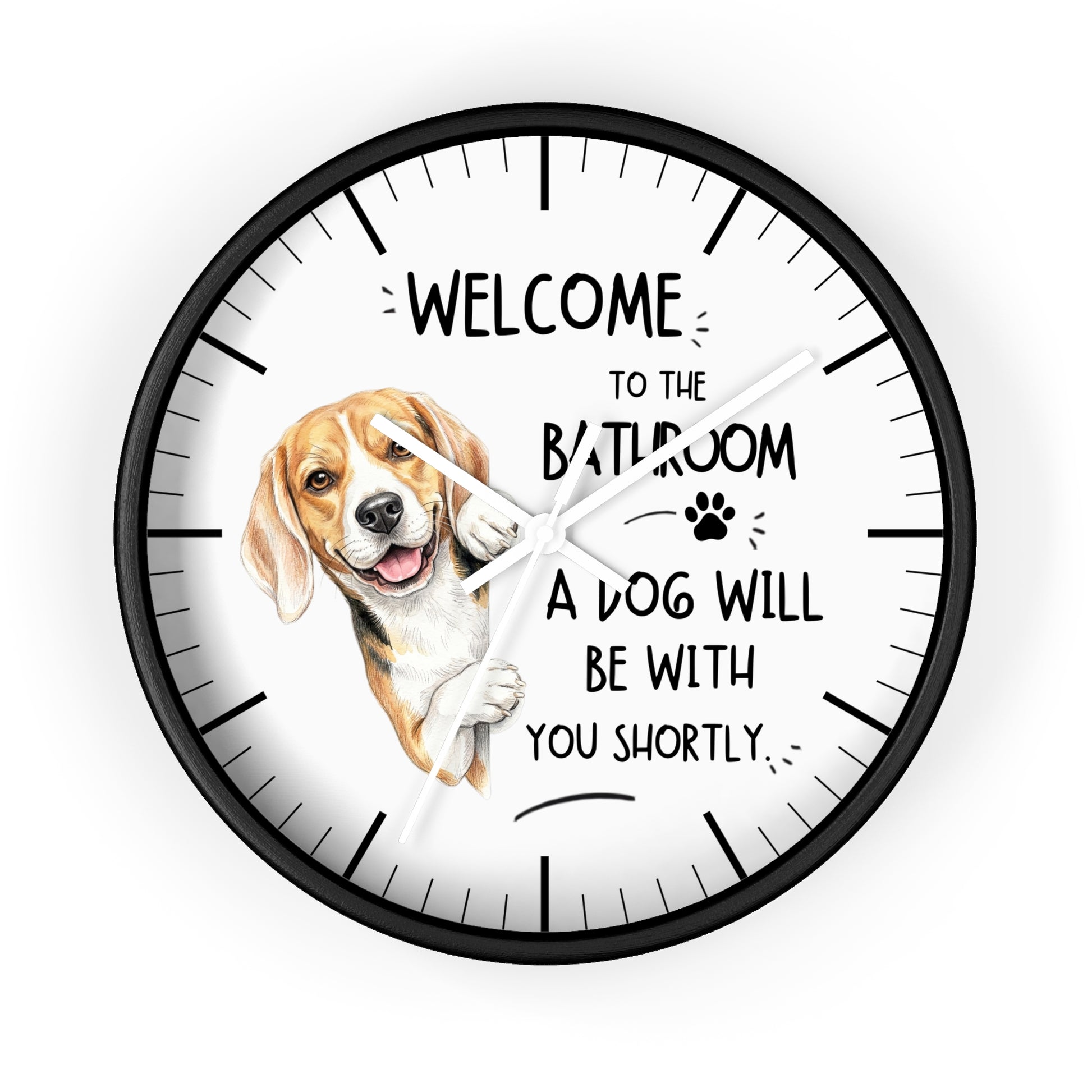 A round wall clock with a black frame and white face, featuring a beagle illustration and the text 'WELCOME TO THE BATHROOM A DOG WILL BE WITH YOU SHORTLY.' on a light gray background.