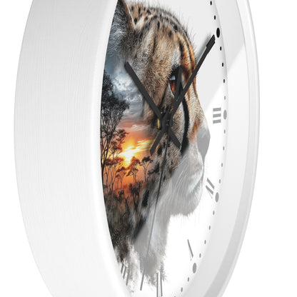 A white round wall clock with a printed design of a cheetah's face and a sunset landscape reflected in its center, shown against a plain white background.