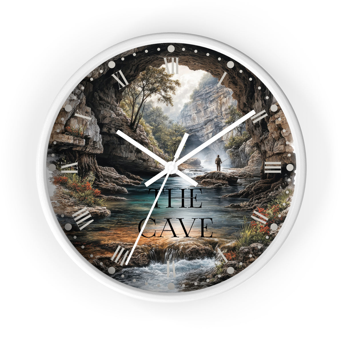 A round wall clock with a white frame and a scenic print of a person standing in a cave overlooking a river and forest. The words 'THE CAVE' are printed on the face.