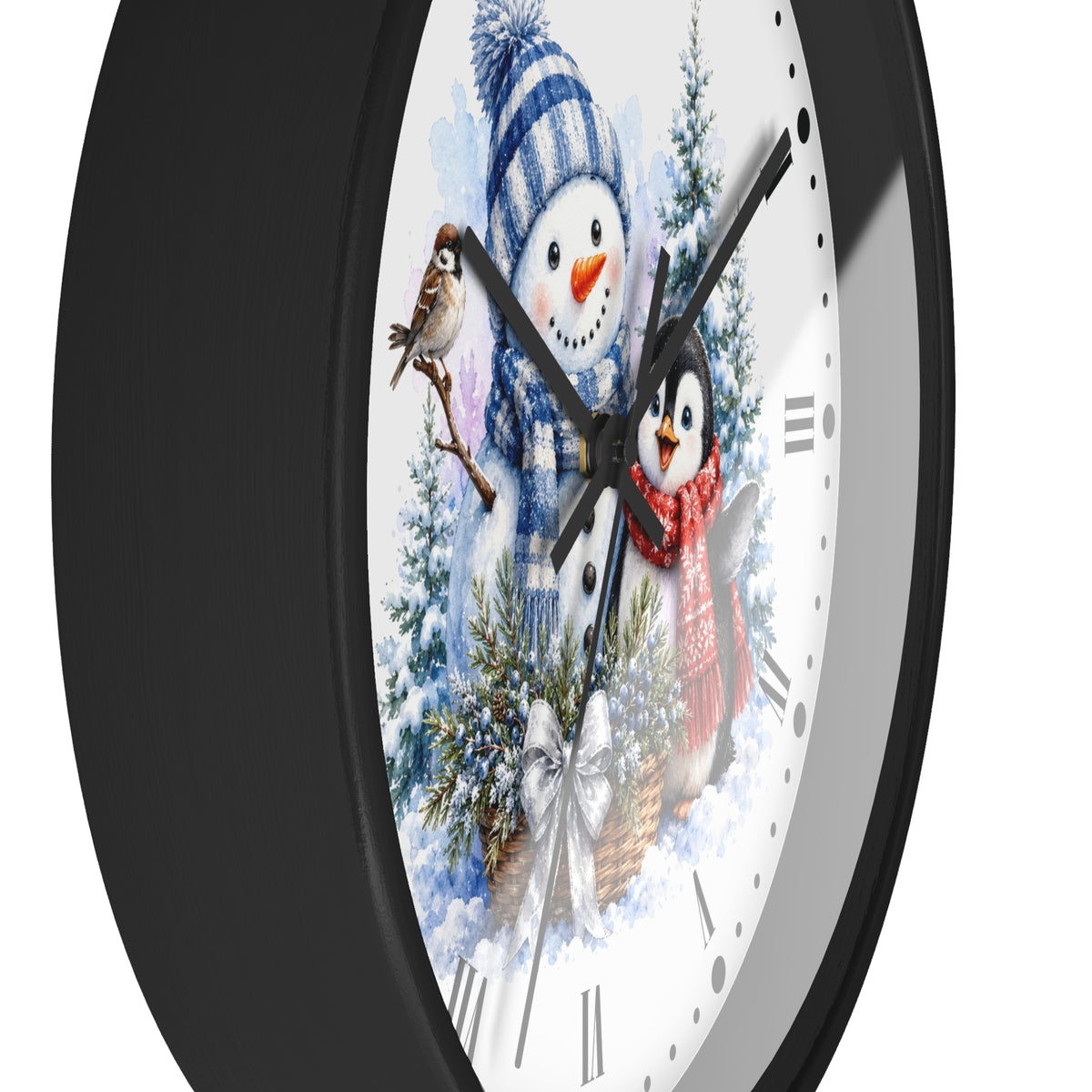 A close-up of a round wall clock with a black frame and a white face featuring a winter holiday illustration of a snowman, a penguin, evergreen trees, and bird perched on the clock hands.