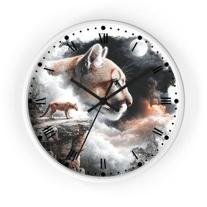 Round wall clock with a surreal printed design featuring a large cat face, a smaller cat standing on a cliff, clouds, moon, and dark sky, with black Roman numerals and clock hands on a white rim.