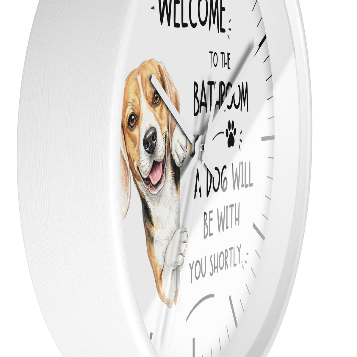 A white round wall clock with a printed illustration of a beagle dog and the text 'WELCOME TO THE BATHROOM A DOG WILL BE WITH YOU SHORTLY' on the front.