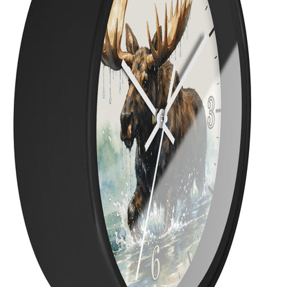 A round wall clock with a black frame and a printed moose artwork on the face, shown against a plain white background.