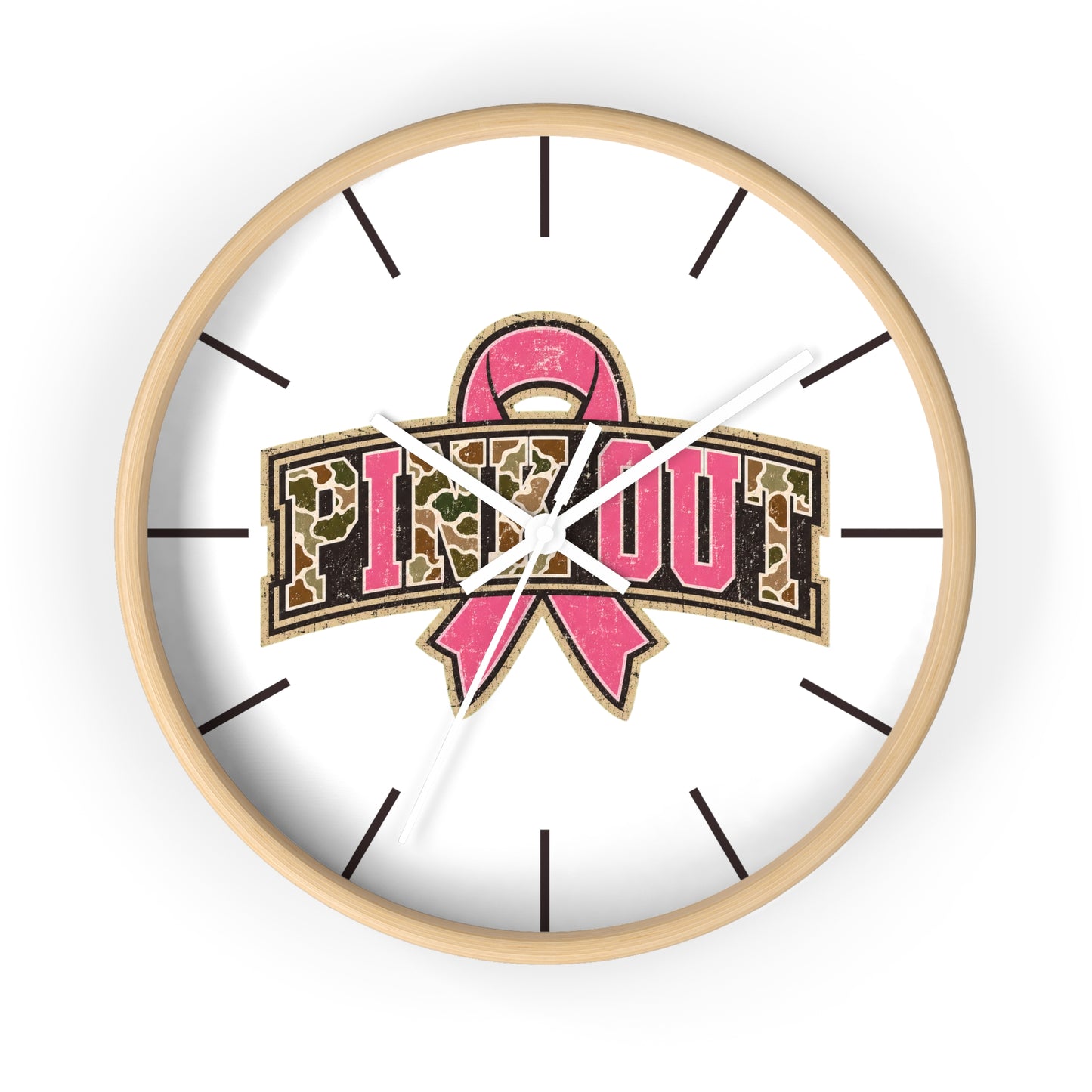 A round white wall clock with a pink breast cancer awareness ribbon and the words 'PINK OUT' in leopard-print lettering, shown against a plain white background.