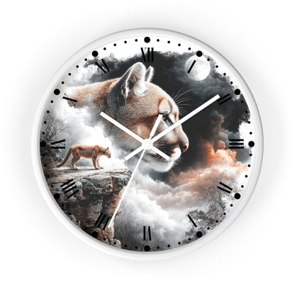 Round wall clock with a surreal printed design featuring a large cat face, a smaller cat standing on a cliff, clouds, moon, and dark sky, surrounded by a white rim and black Roman numerals.